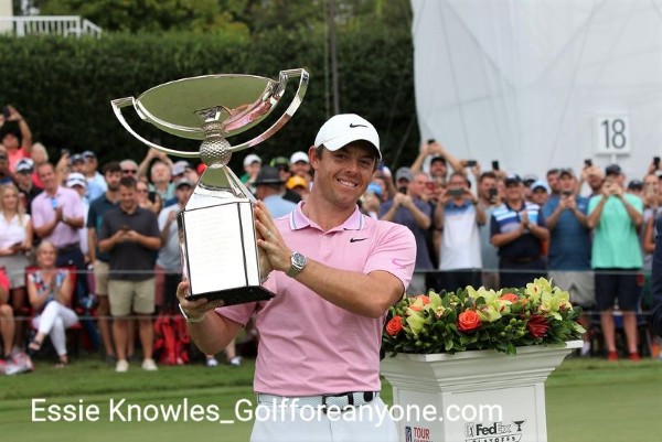 Rory McIlroy holding FedEx cup