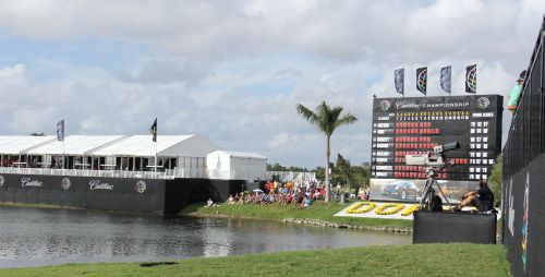 Crowd & leaderboard at the WGC-Cadillac Championship at the TPC.Blue Monster, Doral, FL